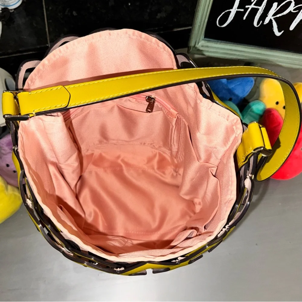 kate spade Yellow Cutout Leather Bucket Shoulder Bag with Pink Liner